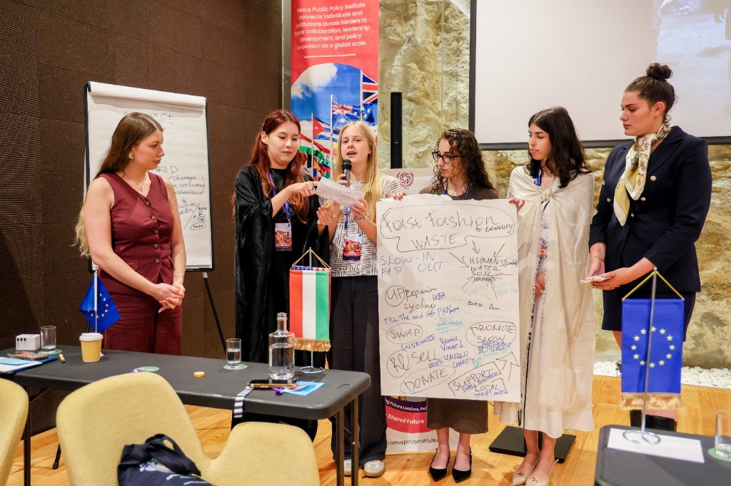Delegates presenting together during curated networking at the summit